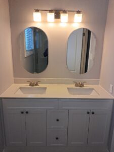 Alt=Double sink bathroom vanity with wood finish
