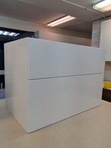 Alt=Minimalist bathroom vanity with handleless design