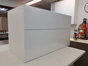 Alt=Modern bathroom vanity with soft close drawers