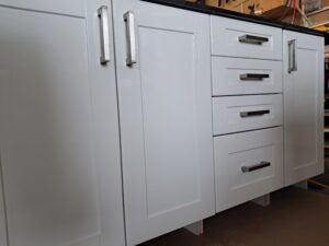 Alt=Modern white kitchen cabinets with Blum Tandembox drawers installed in Ottawa